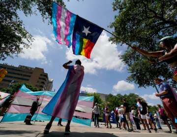 File photo: Demonstrators gather on the steps to the State Capitol to speak against transgender-related legislation bills being considered in the Texas Senate and Texas House, Thursday, May 20, 2021 in Austin, Texas. A Texas judge on Friday, March 11, 2022 blocked the state from investigating as child abuse gender confirming care for transgender youth. District Judge Amy Clark Meachum issued a temporary injunction preventing the state from enforcing Republican Gov. Greg Abbott’s directive to compel the Department of Family and Protective Services to investigate.