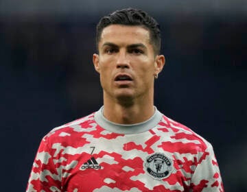File photo: Manchester United's Cristiano Ronaldo warms up ahead of an English Premier League soccer match at the Tottenham Hotspur Stadium in London on Oct. 30, 2021. A bid by the New York Times to obtain a Las Vegas police file compiled about Cristiano Ronaldo after a Nevada woman claimed in 2018 that the international soccer star raped her in 2009 could be moved from federal to state court