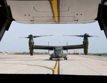 File photo: A U.S. Marine Corps Osprey aircraft taxies behind an Osprey carrying members of the White House press corps at Andrews Air Force Base, Md., on April 24, 2021. (AP Photo/Patrick Semansky)