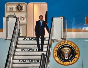 U.S. President Joe Biden steps off Air Force One as he arrives at Melsbroek military airport in Brussels, Wednesday, March 23, 2022. Western leaders are arriving in Brussels for Thursday's summits taking place at NATO and EU headquarters where they will seek to highlight their sense of unity in the face of the Russian invasion in Ukraine