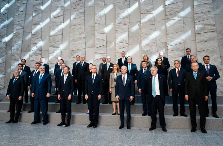 NATO heads of state pose for a group photo during an extraordinary NATO summit at NATO headquarters in Brussels, Thursday, March 24, 2022. As the war in Ukraine grinds into a second month, President Joe Biden and Western allies are gathering to chart a path to ramp up pressure on Russian President Vladimir Putin while tending to the economic and security fallout that's spreading across Europe and the world. (AP Photo/Thibault Camus)