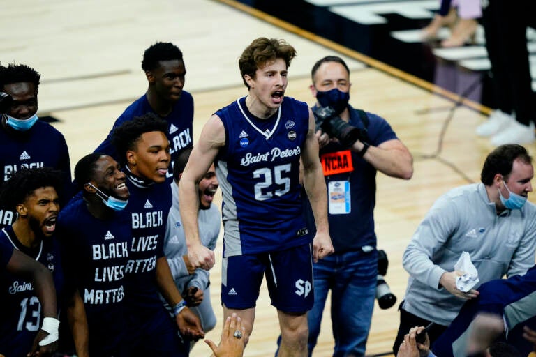 Saint Peter's Doug Edert celebrates after Saint Peter's won a college basketball game against Purdue in the Sweet 16 round of the NCAA tournament, Friday, March 25, 2022, in Philadelphia. (AP Photo/Matt Slocum)