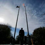 File photo: Military personnel stand at attention during Veterans Day ceremonies at Brig. Gen. William C. Doyle Veterans Memorial cemetery, in Wrightstown, N.J. (AP Photo/Mel Evans)