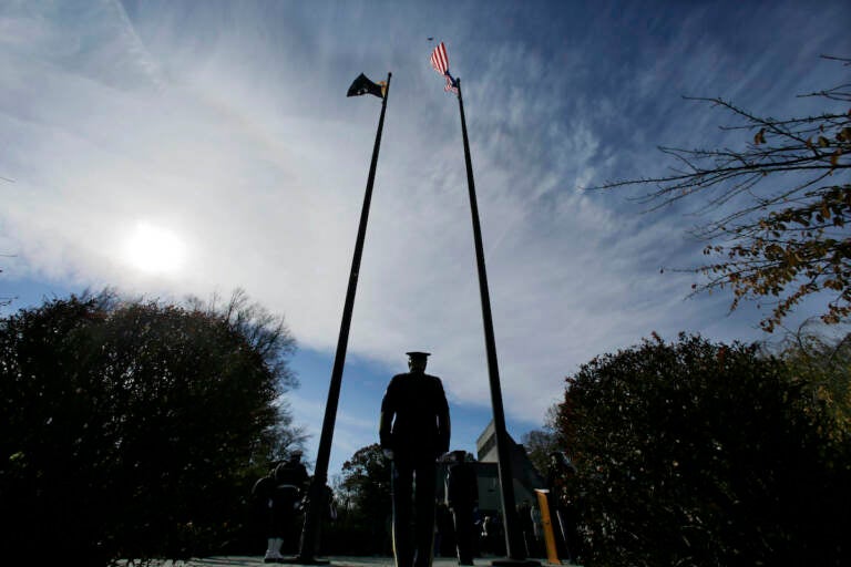 File photo: Military personnel stand at attention during Veterans Day ceremonies at Brig. Gen. William C. Doyle Veterans Memorial cemetery, in Wrightstown, N.J. (AP Photo/Mel Evans)