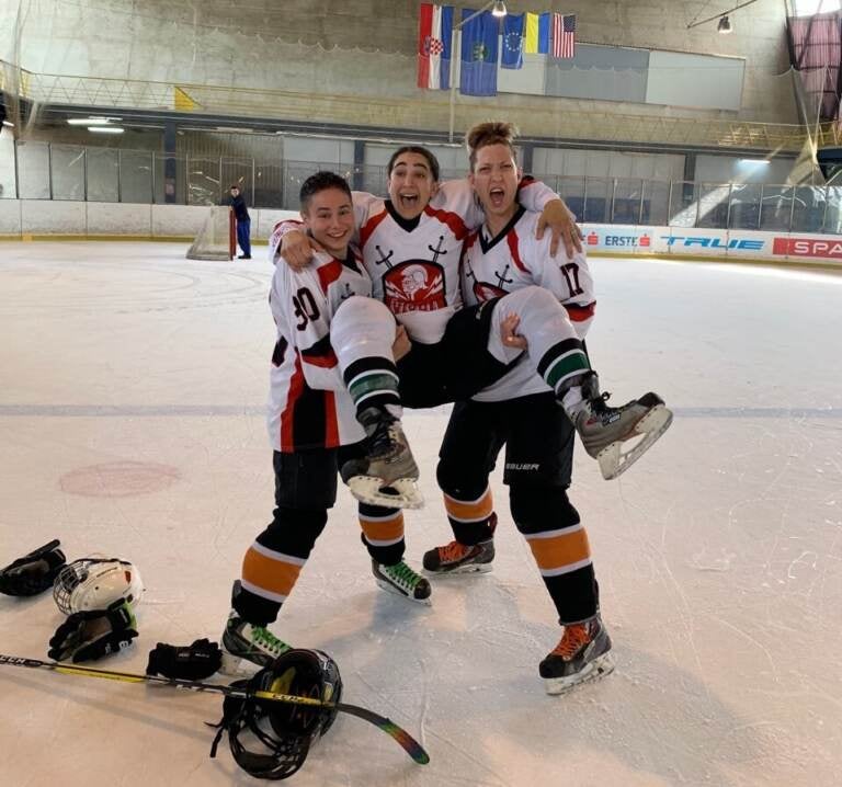 Anna Gardner (middle) held up by Alika (left) and Vika Gadliya (right) following a tournament in Zagreb