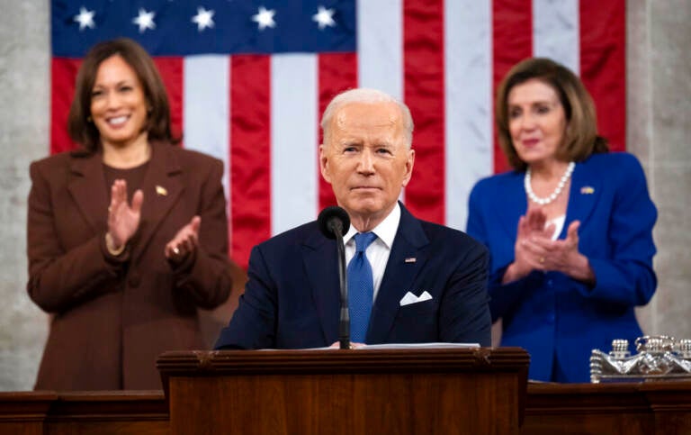 President Joe Biden delivers his first State of the Union address to a joint session of Congress at the Capitol, as Vice President Kamala Harris and House Speaker Nancy Pelosi of Calif., watch, Tuesday, March 1, 2022, in Washington. (Saul Loeb/Pool via AP)