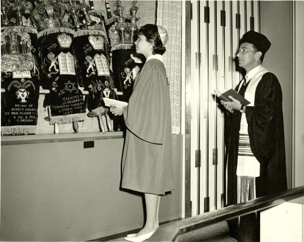 Adena Greenberg, with her father, Rabbi Sidney Greenberg, during her bat mitzvah ceremony on May 15, 1964. The ceremony took place at his congregation, Temple Sinai, in Dresher, Penn.