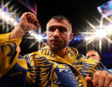 Vasiliy Lomachenko exits the arena after winning the WBA, WBO, WBC Lightweight World Title contest in 2019 in London. (Richard Heathcote/Getty Images)