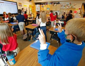 Students wear masks as a teacher instructs them at Freedom Preparatory Academy on Sept. 10, 2020 in Provo, Utah.
(GEORGE FREY/AFP via Getty Images)