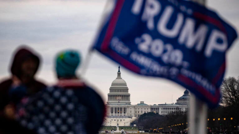 Supporters of then-President Donald Trump begin to gather for a rally on Jan. 6, 2021, in the vicinity of the U.S. Capitol and National Mall. Some of these supporters later rioted at the Capitol. New records show a gap of more than seven hours in Trump's phone call record around the time of the siege. (Samuel Corum/Getty Images)