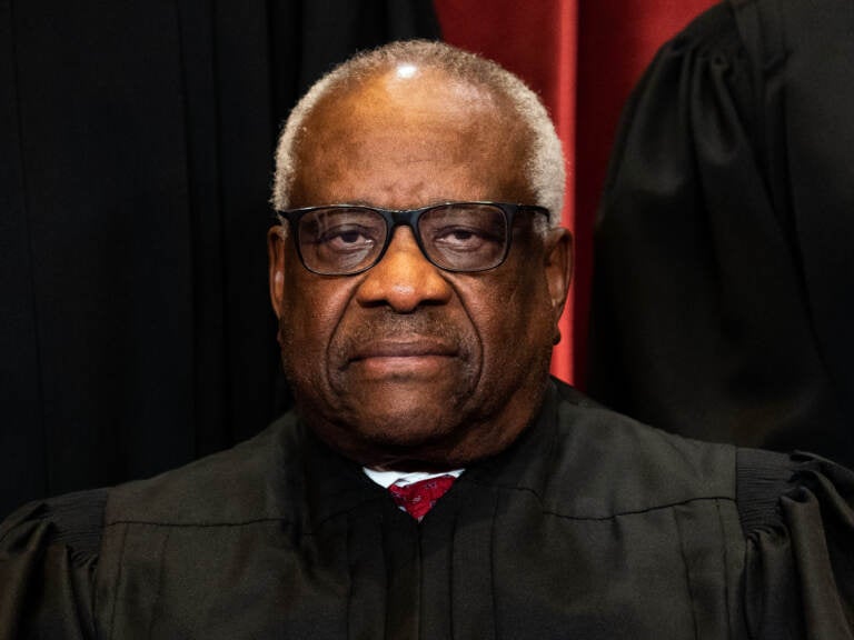 What Justice Clarence Thomas knew about his wife's text messages with Mark Meadows, the White House chief of staff in the Trump administration, is the subject of increasing scrutiny. (Erin Schaff/Pool/Getty Images)