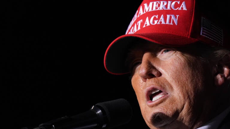 Former US President Donald Trump speaks to the crowd during a rally at the Florence Regional Airport on March 12, 2022 in Florence, South Carolina. (Sean Rayford/Getty Images)