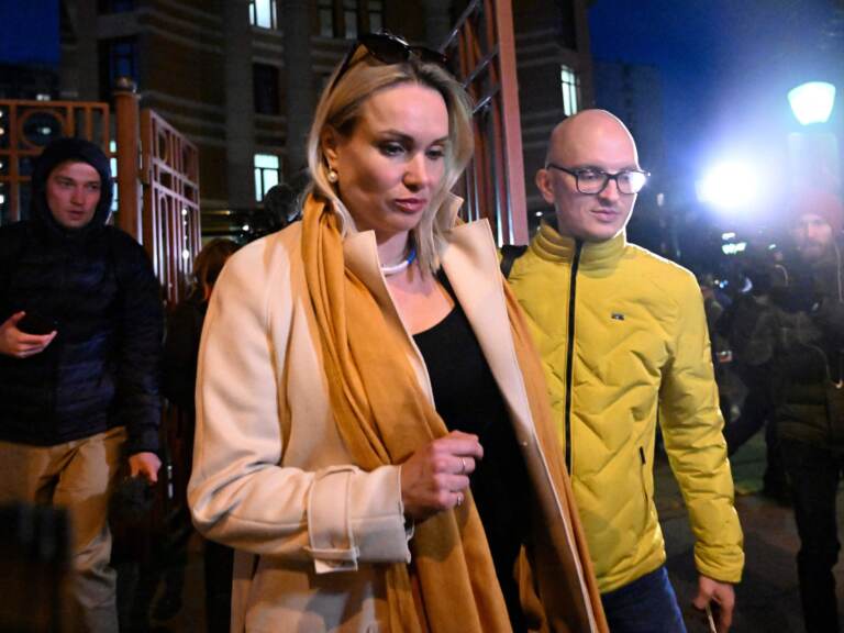 Marina Ovsyannikova, the editor at the state broadcaster Channel One who protested against Russian military action in Ukraine during the evening news broadcast at the station late Monday, leaves the Ostankinsky District Court after being fined for 30,000 rubles ($280, 247 euros) for breaching protest laws in Moscow on March 15, 2022. (AFP via Getty Images)