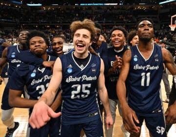 St. Peter's Peacocks players celebrate after defeating Murray State Racers in the second round of the 2022 NCAA Men's Basketball Tournament held at Gainbridge Fieldhouse on March 19, 2022 in Indianapolis, Indiana. Murray State won 70-60. (Photo by Jamie Sabau/NCAA Photos via Getty Images)