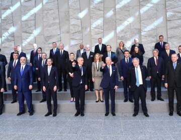 Leaders of NATO member nations pose for a family photo at NATO Headquarters in Brussels on March 24.