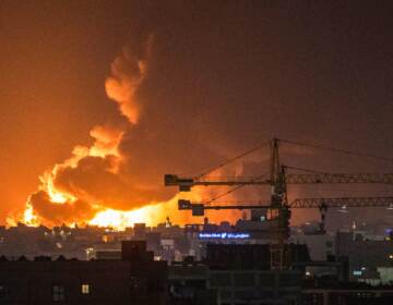 Smoke and flames rise from a Saudi Aramco oil facility in Saudi Arabia's Red Sea coastal city of Jeddah, on March 25, 2022, following a reported Yemeni rebels attack. (Andrej Isakovic/AFP via Getty Images)