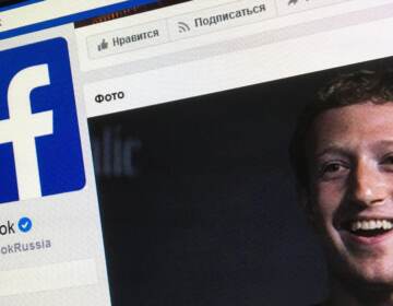 A picture taken in Moscow on March 22, 2018 shows an illustration picture of the Russian language version of Facebook about page featuring the face of founder and CEO Mark Zuckerberg. (Mladen Antonov/AFP via Getty Images)