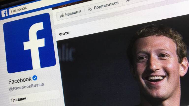 A picture taken in Moscow on March 22, 2018 shows an illustration picture of the Russian language version of Facebook about page featuring the face of founder and CEO Mark Zuckerberg. (Mladen Antonov/AFP via Getty Images)