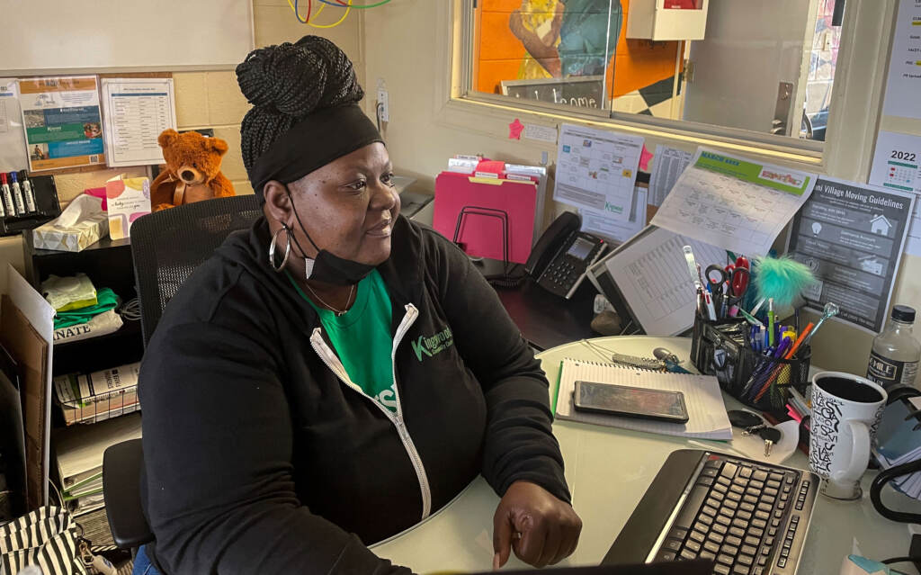 Josie Haile sits at her computer