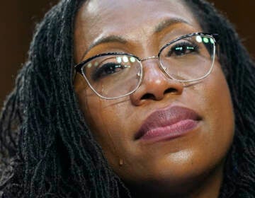 A tear rolls down Supreme Court nominee Ketanji Brown Jackson's chee