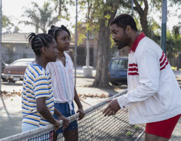 Demi Singleton and Saniyya Sidney with Will Smith in ''King Richard.'' (Chiabella James/Warner Bros. Entertainment Inc.)