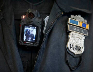 FILE – In this Dec. 11, 2014, file photo, a Philadelphia police officer demonstrates a body-worn camera used as part of a pilot project in Philadelphia. Government offices across Pennsylvania didn't apply the state's Right-to-Know Law uniformly, according to a May 2016 survey by 21 newspapers. Dash-cam videos have fueled a national debate on police policies and tactics, but in Pennsylvania those images remain largely out of sight, thanks to state laws that give law enforcement broad power to keep out of public view anything considered to be investigative material. (AP Photo/Matt Rourke, File)