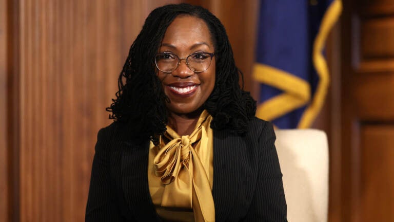 Senate Leaders Meet With Supreme Court Nominee Ketanji Brown Jackson A portrait-style photo of U.S. Supreme Court nominee, Ketanji Brown Jackson. She's smiling, wearing a gold-colored blouse and black jacket.