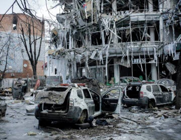 Damaged vehicles and buildings in Kharkiv city center