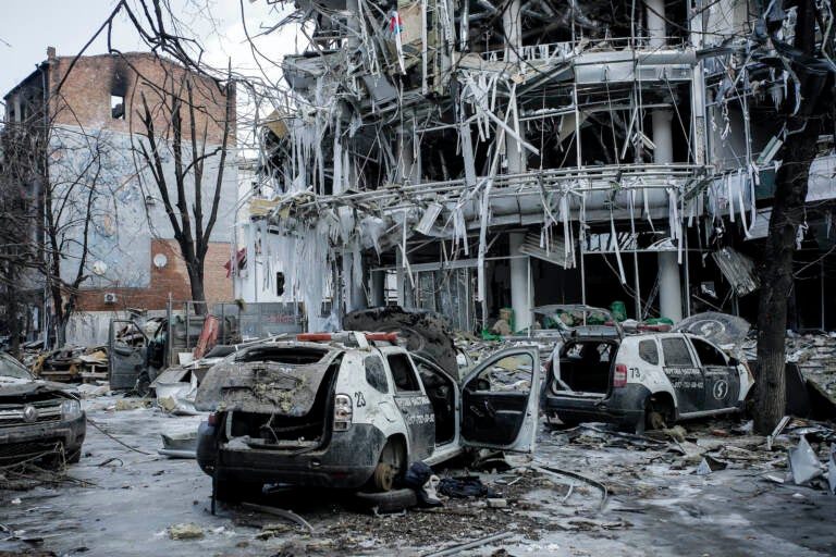 Damaged vehicles and buildings in Kharkiv city center