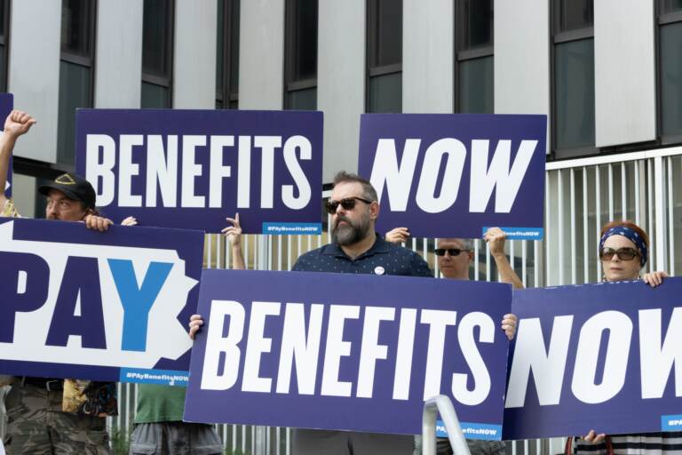 Demonstrators at a rally last year about the state's unemployment backlog. (Ashton Jones / 90.5 WESA)