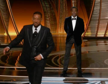 Will Smith walks off stage at the Oscars after slapping Chris Rock, who made a joke about Jada Pinkett Smith's hair. March 27, 2022.