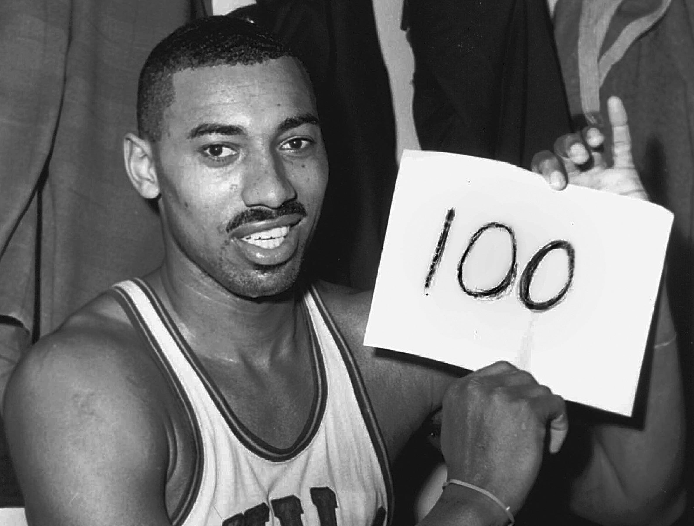 Who scored 100 points in a single game as a 76er