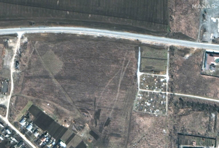 March 19, 2022: an overview of a cemetery and the early expansion of graves.
(Satellite image ©2022 Maxar Technologies)