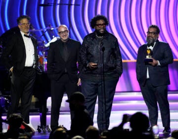 Robert Fyvolent, from left, David Dinerstein, Questlove, and Joseph Patel accept the award for best music film album