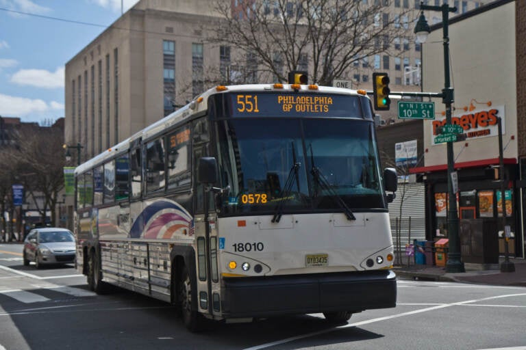 NJ Transit’s 551 bus travels on Market Street in Philadelphia.