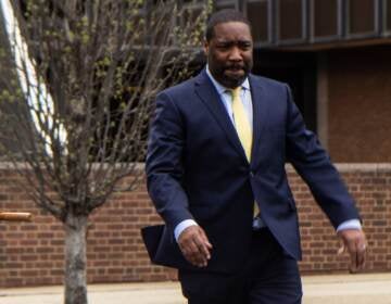 File photo: Philadelphia Councilmember Kenyatta Johnson exits the federal courthouse with family on April 14, 2022. (Kimberly Paynter/WHYY)