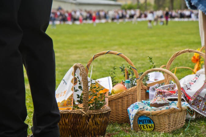 Easter baskets on the ground at the Ukrainian Easter service.