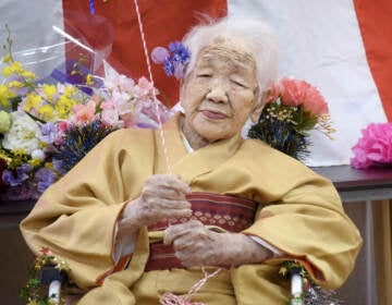 Kane Tanaka, born in 1903, smiles as a nursing home celebrates three days after her 117th birthday in Fukuoka, Japan, on Jan. 5, 2020. (Kyodo/Reuters)