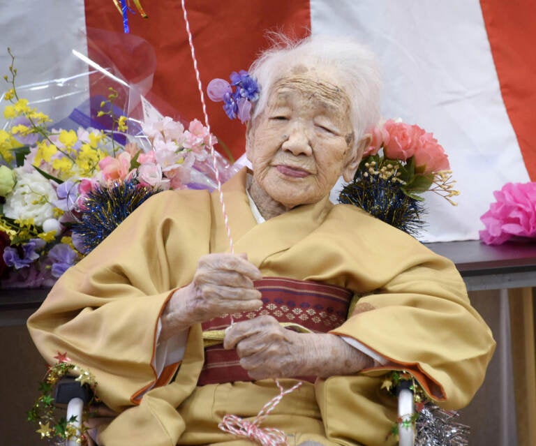 Kane Tanaka, born in 1903, smiles as a nursing home celebrates three days after her 117th birthday in Fukuoka, Japan, on Jan. 5, 2020. (Kyodo/Reuters)