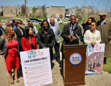 Philadelphia City Council President Darrell Clarke and other members of City Council announce that city-owned vacant lots at the corner of 55th and Poplar streets will be home to 41 affordable housing units as part of the city's Turn The Key program to promote home ownership. (Emma Lee/WHYY)