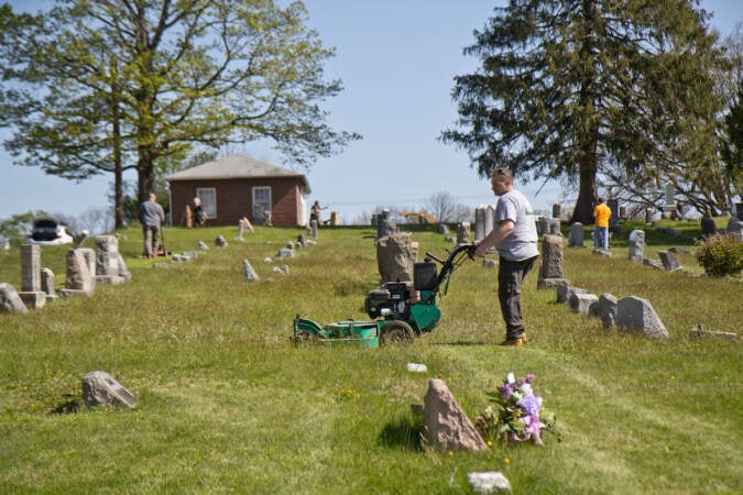 Residents of Pottstown cleaned and beautified Edgewood Cemetery on April 30, 2022. (Kimberly Paynter/WHYY)