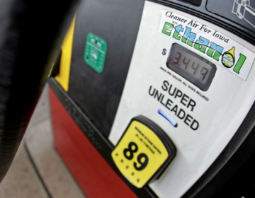 A motorist fills up with gasoline containing ethanol in Des Moines, Iowa. President Biden will announce today that he will lift the summer restriction on gasoline containing the E15 ethanol blend. (Charlie Riedel/AP file photo)