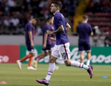 United States' Christian Pulisic, a native of Hershey, Pa., enters the field to warm up prior to a qualifying soccer match against Costa Rica for the FIFA World Cup Qatar 2022 in San Jose, Costa Rica, Wednesday, March 30, 2022