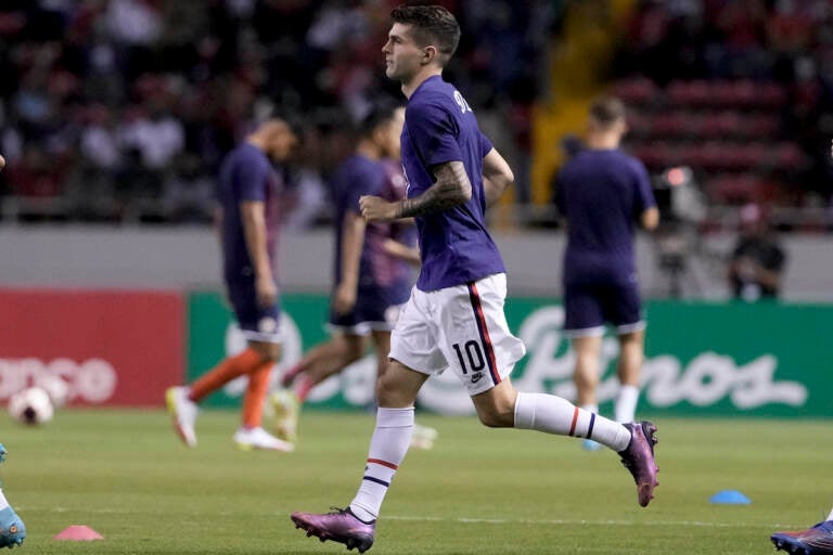 United States' Christian Pulisic, a native of Hershey, Pa., enters the field to warm up prior to a qualifying soccer match against Costa Rica for the FIFA World Cup Qatar 2022 in San Jose, Costa Rica, Wednesday, March 30, 2022