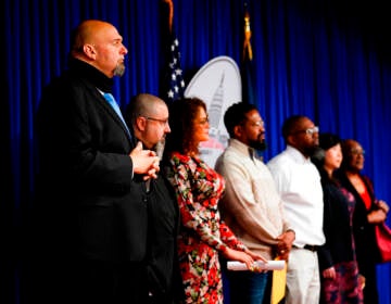 Pennsylvania Lt. Gov. John Fetterman listens at a news conference about moving the process to apply for clemency online to improve access to criminal justice and to reduce the wait by years, at the Pennsylvania Capitol in Harrisburg, Pa., Monday, April 4, 2022.