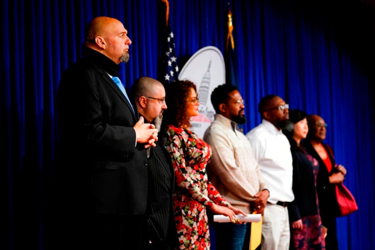 Pennsylvania Lt. Gov. John Fetterman listens at a news conference about moving the process to apply for clemency online to improve access to criminal justice and to reduce the wait by years, at the Pennsylvania Capitol in Harrisburg, Pa., Monday, April 4, 2022.