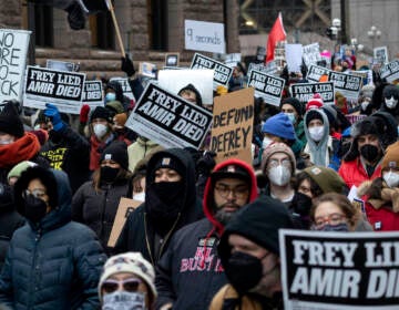 File photo: People march at a rally for Amir Locke on Saturday, Feb. 5, 2022, in Minneapolis. Minnesota prosecutors declined to file charges Wednesday, April 6, 2022, against a Minneapolis police SWAT team officer who fatally shot Amir Locke while executing an early morning no-knock search warrant in a downtown apartment in February