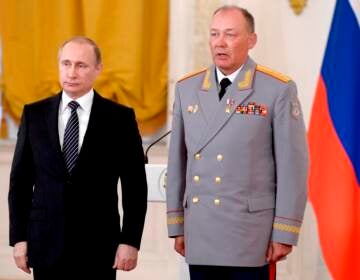 In this photo taken on March 17, 2016, Russian President Vladimir Putin, left, poses with Col. Gen. Alexander Dvornikov during an awarding ceremony in Moscow's Kremlin, Russia. Russia has appointed a new Ukraine war commander. A top U.S. official on Sunday, April 10, 2022 said Russia named Gen. Dvornikov as commander of an armed campaign that Russian authorities still refer to as a “special military operation.