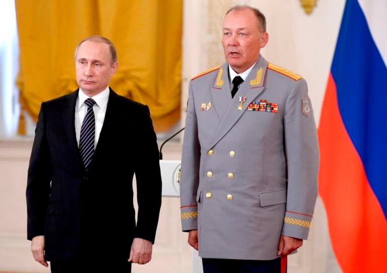 In this photo taken on March 17, 2016, Russian President Vladimir Putin, left, poses with Col. Gen. Alexander Dvornikov during an awarding ceremony in Moscow's Kremlin, Russia. Russia has appointed a new Ukraine war commander. A top U.S. official on Sunday, April 10, 2022 said Russia named Gen. Dvornikov as commander of an armed campaign that Russian authorities still refer to as a “special military operation.