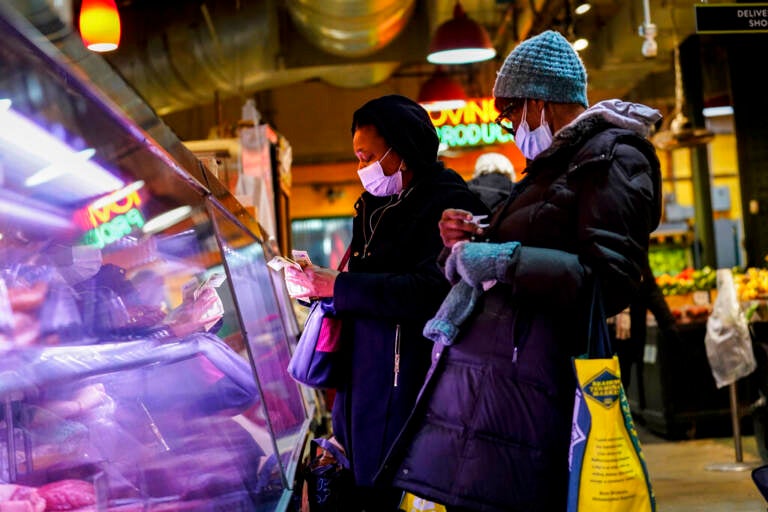Customers wearing face masks at Reading Terminal Market.